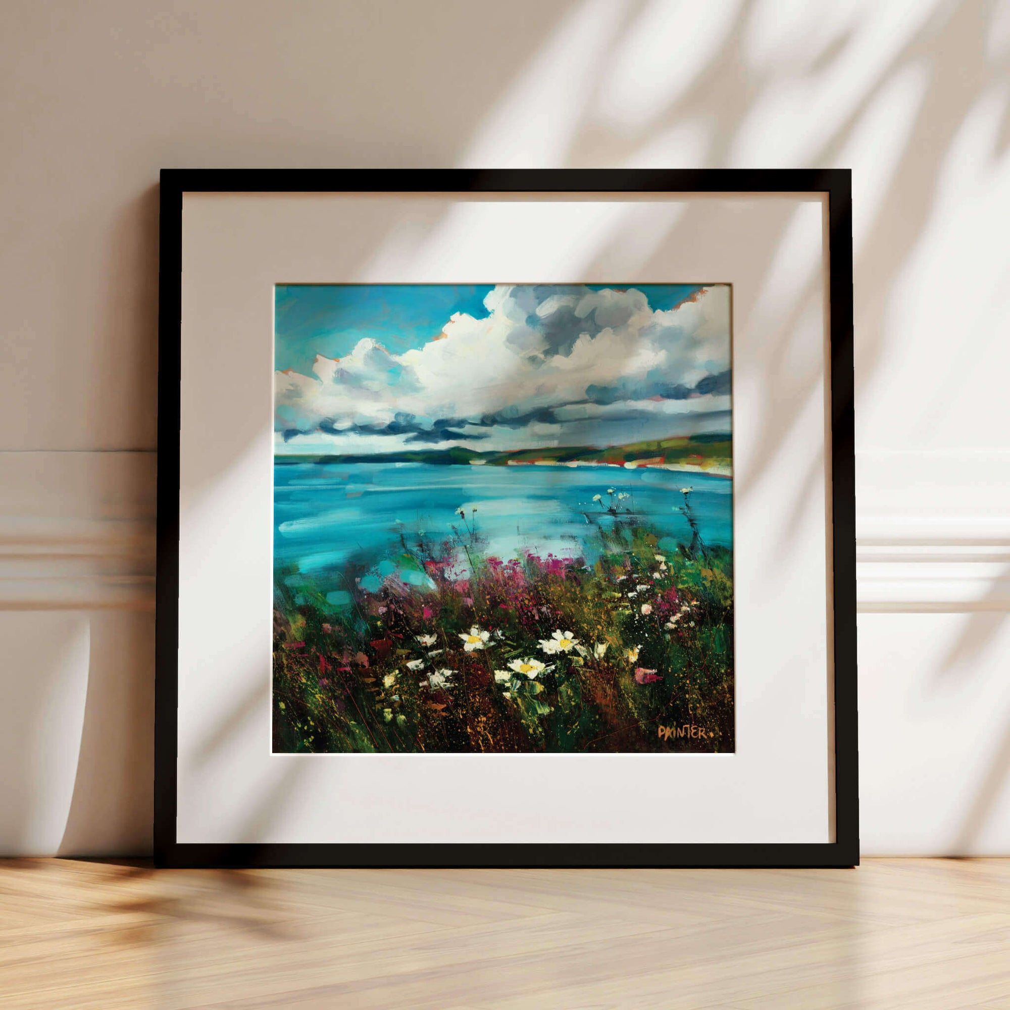Be Free, framed seascape prints in black wood ready to hang of coastal landscape near Porthleven with rocky cliffs, sea flowers and blue sky by Cornish art by Rachel Painter artist