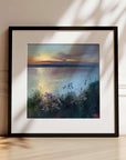 Scatter The Seeds Of Your Dreams No.3, seascape art prints of Cornwall Porthtowan beach - a clifftop view with flowers overlooking the sea at sunset, framed art prints in black by landscape artist Rachel Painter