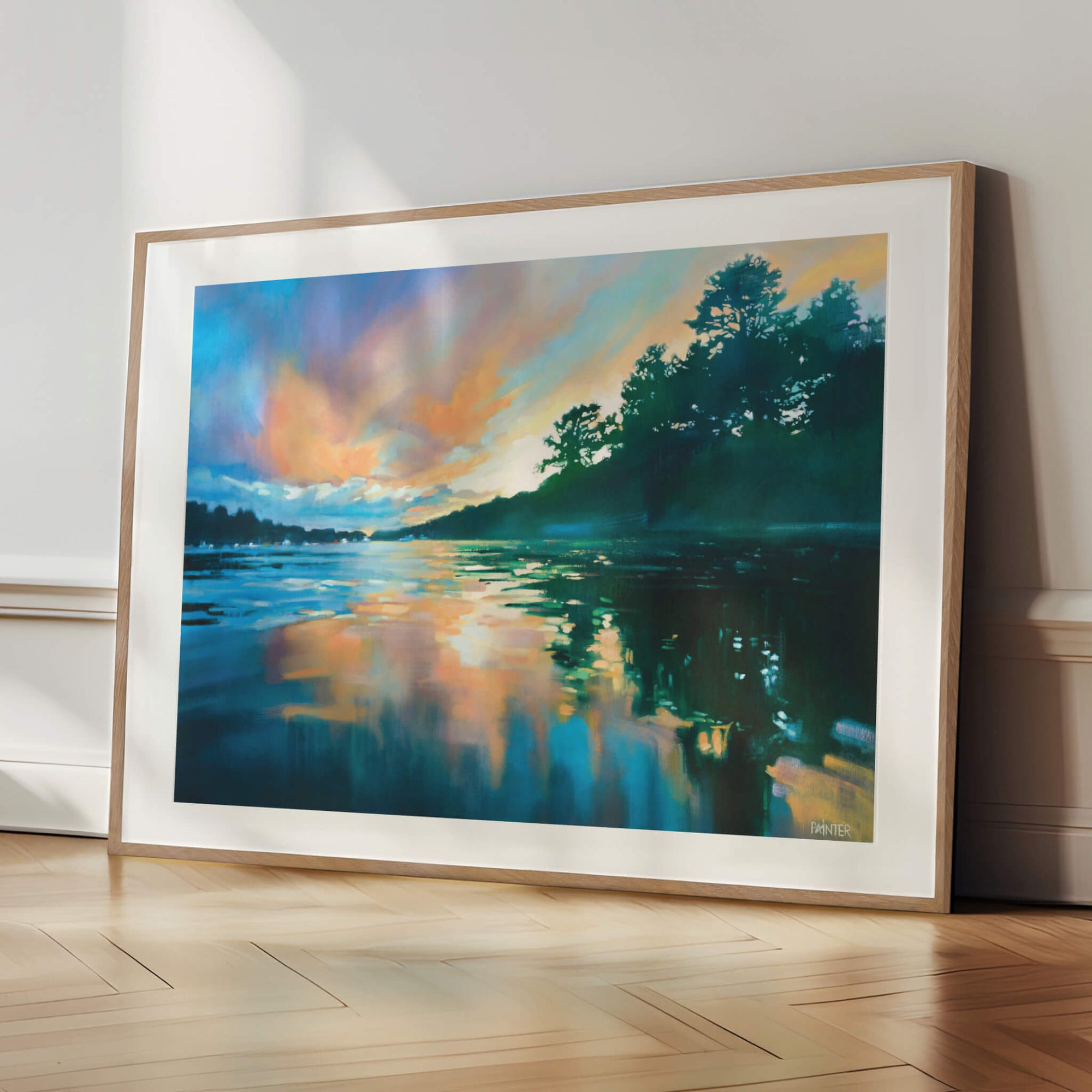 Paved In Light No.3, framed landscape prints in oak wood ready hang of Cornish Helford River at sunset, a calming artwork by British artist Rachel Painter