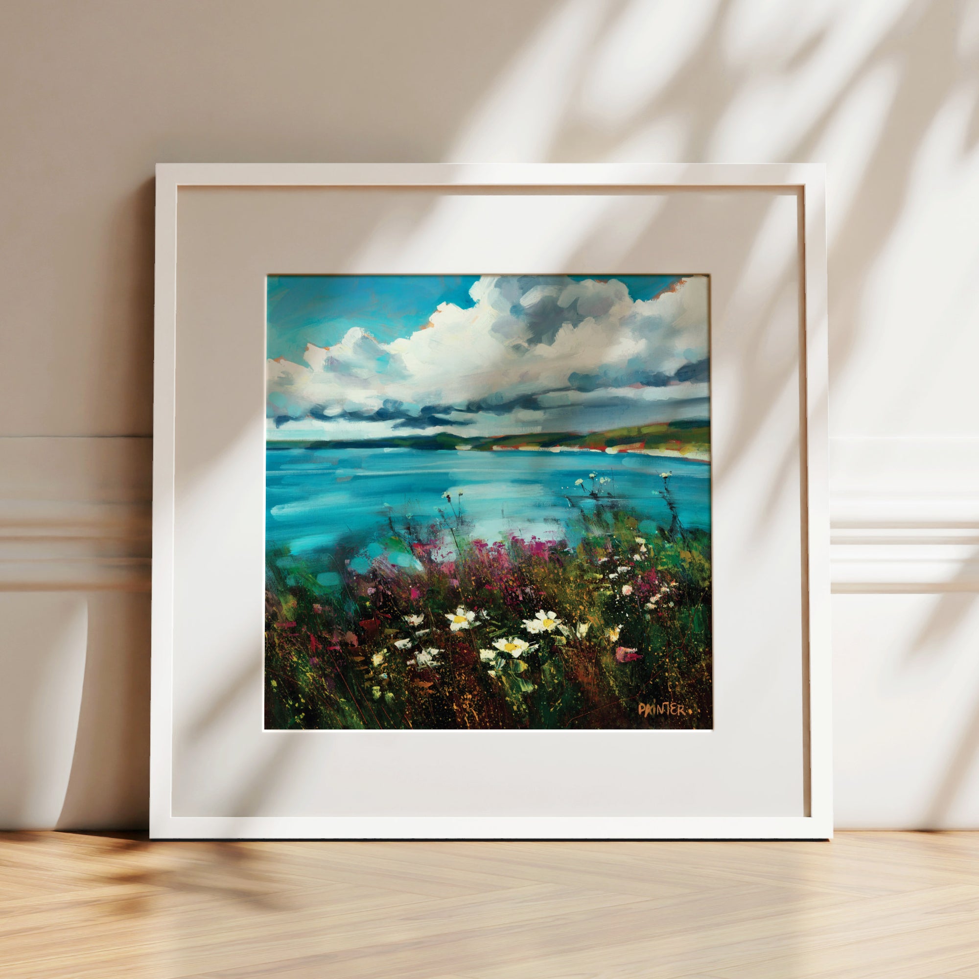 Be Free, framed landscape prints in white wood ready hang of the Cornish coast near Porthleven with rugged cliffs, sea flowers overlooking the ocean by Cornwall artist Rachel Painter