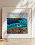 Upon A Pavement Of Sapphire, white framed coastal art prints of cliffs over turquoise sea near Portreath with pink sea flowers by Cornwall artist Rachel Painter
