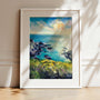 Wild & Free, Cornish art print of seascape landscape near Porthleven with rocky cliffs, sea flowers and blue sky overlooking the ocean, framed art print in white wood ready to hang by Cornish artist Rachel Painter