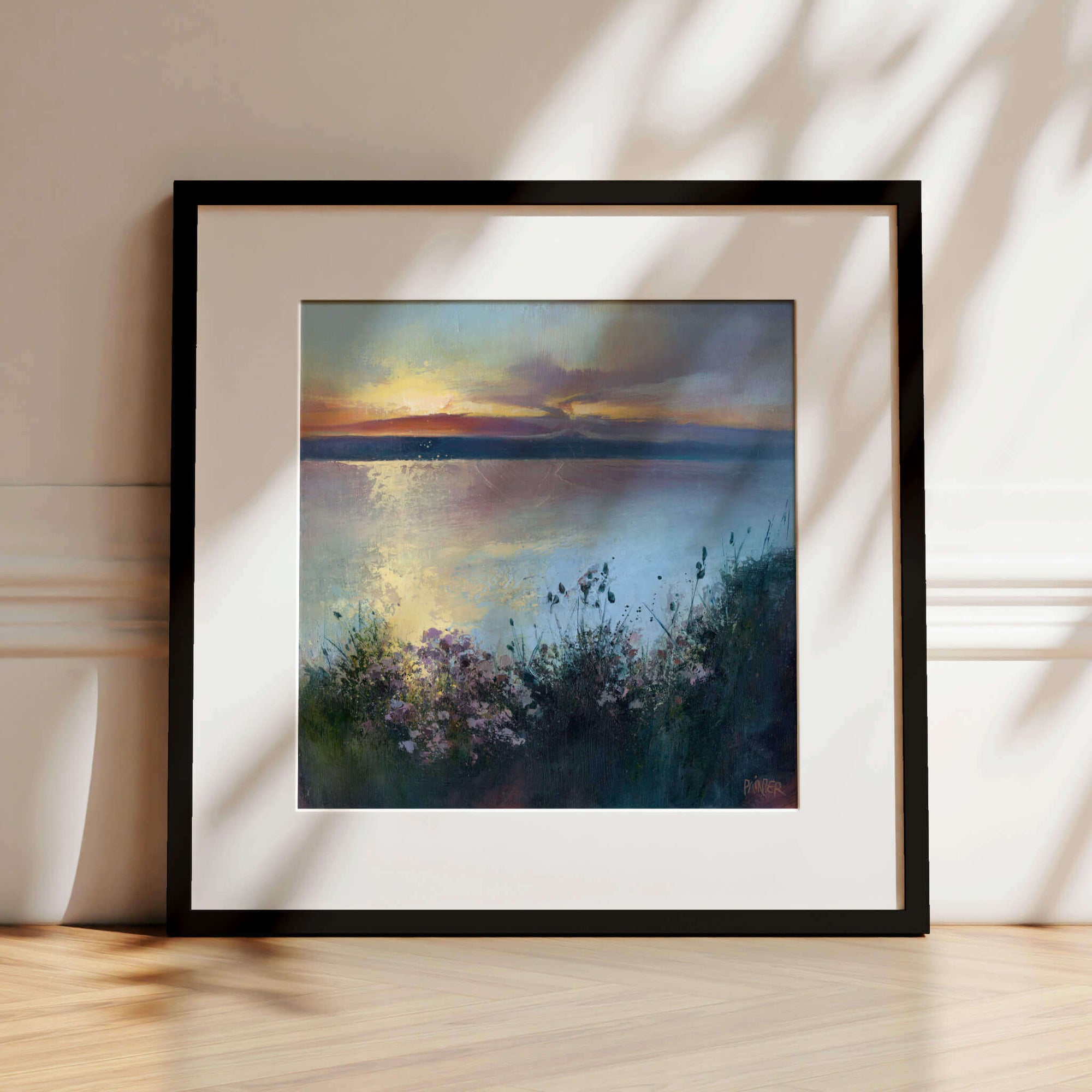 Scatter The Seeds Of Your Dreams No.3, seascape art prints of Cornwall Porthtowan beach - a clifftop view with flowers overlooking the sea at sunset, framed art prints in black by landscape artist Rachel Painter