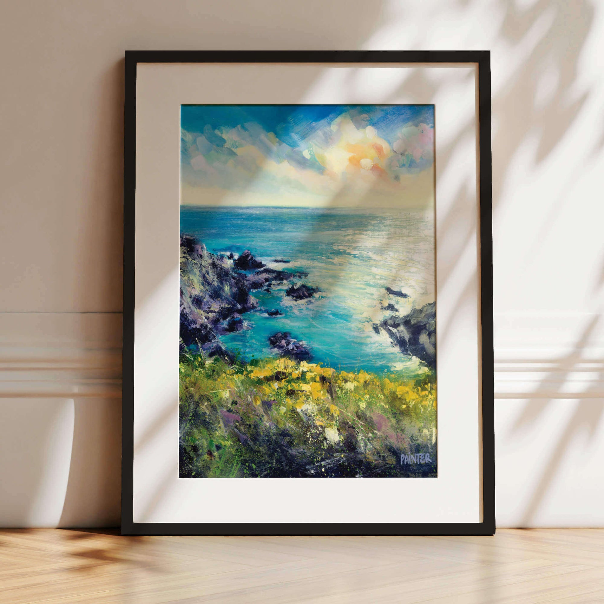 Wild and Free, Cornwall prints framed in black ready to hang of coastal landscape near Porthleven with rocky cliffs and blue sky by Cornish art by Rachel Painter artist
