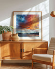 Wooden sideboard with decorative items and a colourful Cornwall art print in a living room - by Rachel Painter, contemporary landscape artist