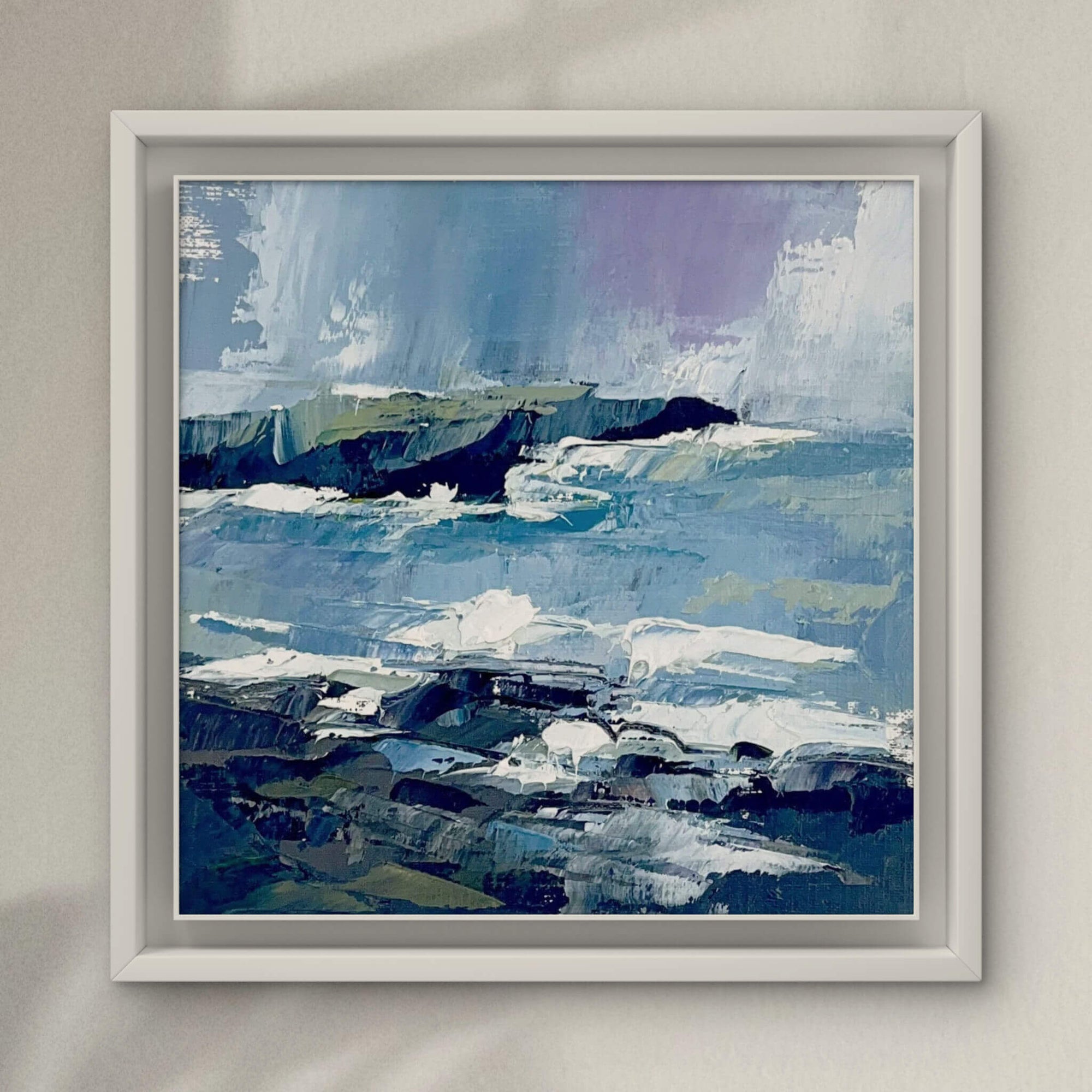 Small framed abstract coastal seascape painting with blue and grey tones of Atlanta Trevone Bay in North Cornwall by Rachel Painter