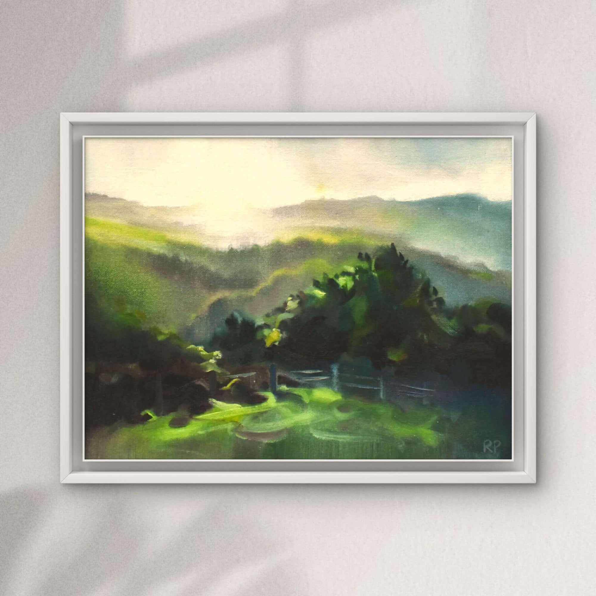 Small framed painting of a green landscape overlooking the moors with sunlight pouring into the valleys- by Rachel Painter artist