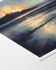 Fine art paper print with white border of a sunset over water with a white border