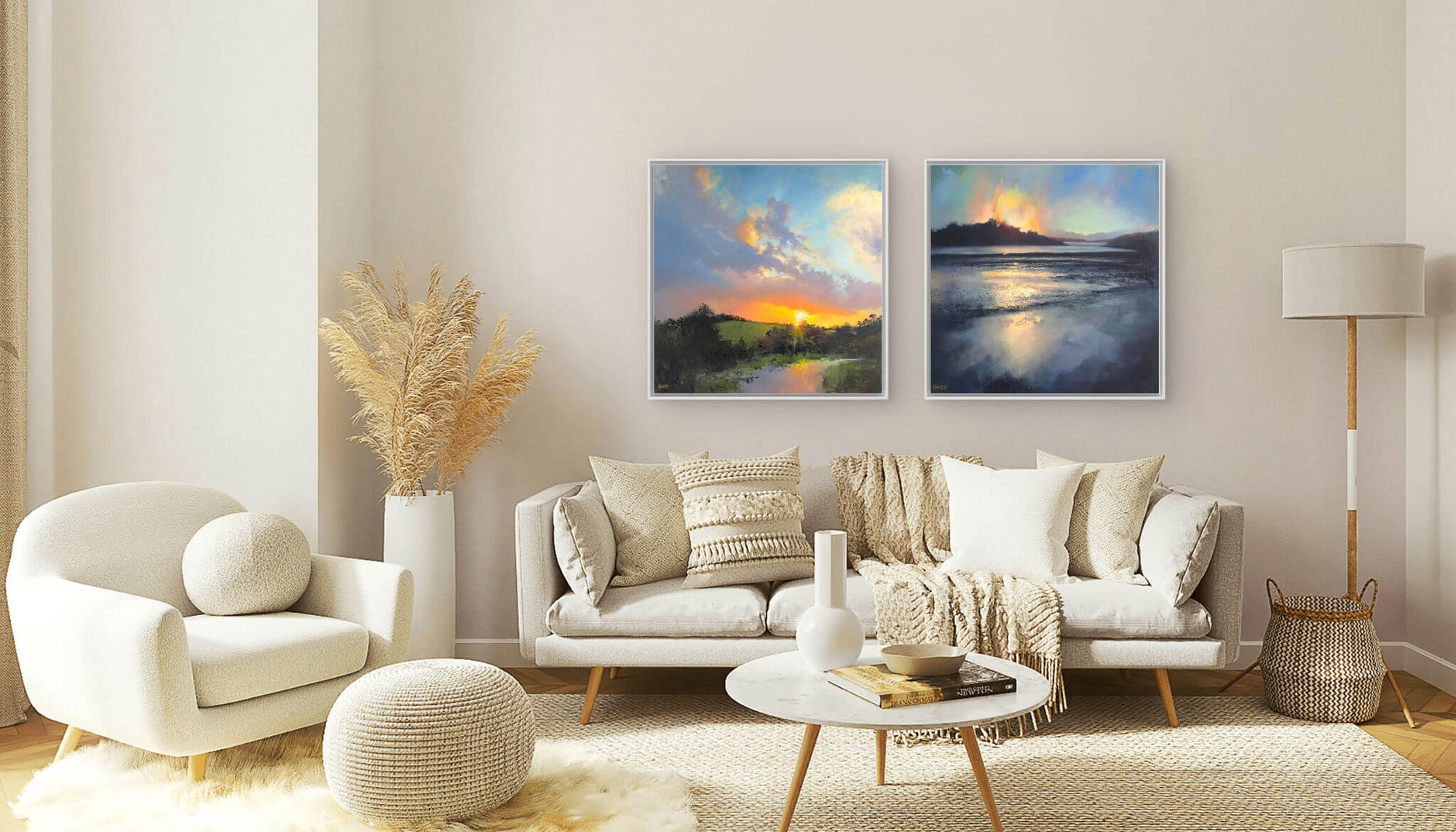 Contemporary landscape paintings by Cornish artist Rachel Painter, in modern living room with a sofa, armchair, and coffee table.
