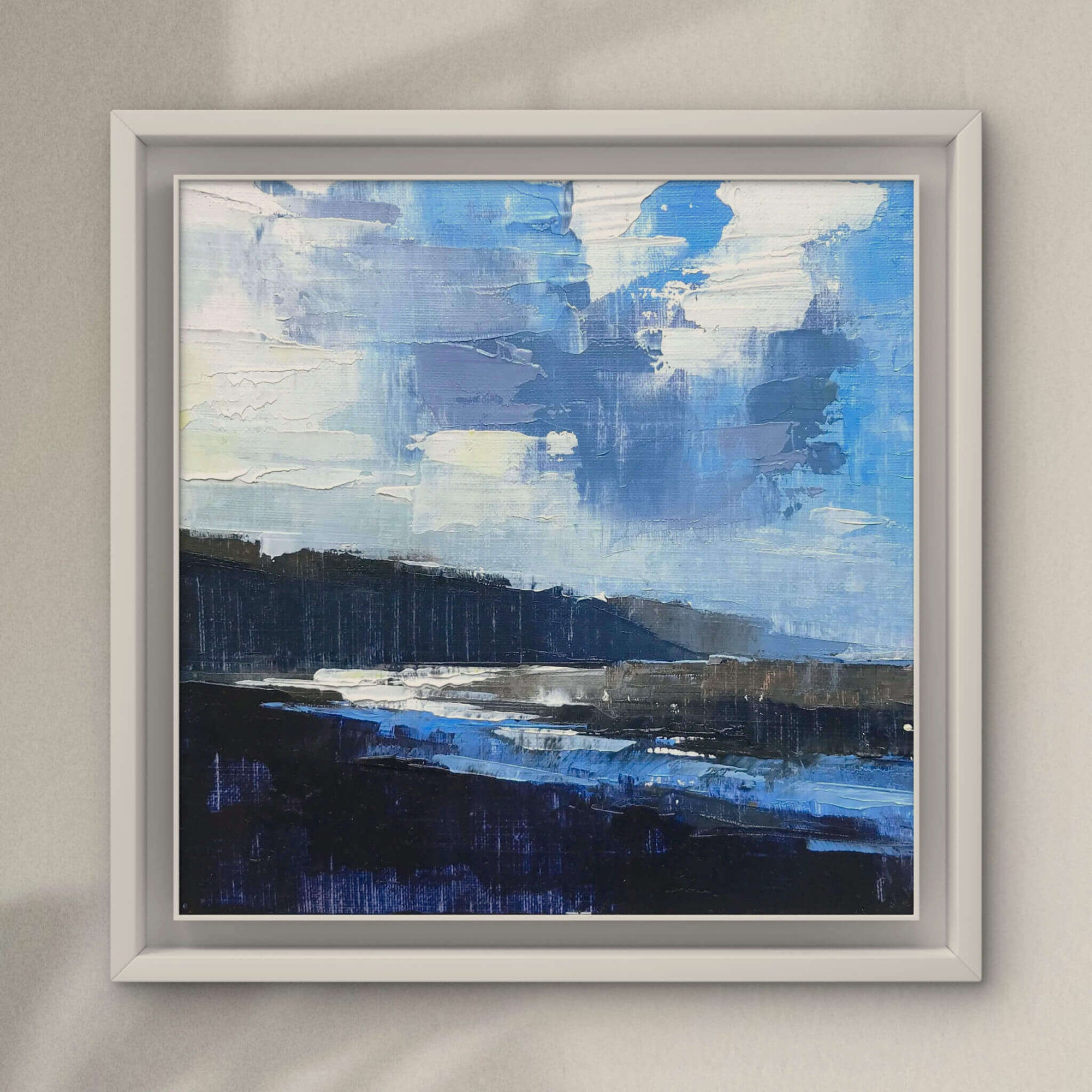 Small seascape oil painting framed in white tray frame, painted in expressive palette knife techniques by Rachel Painter