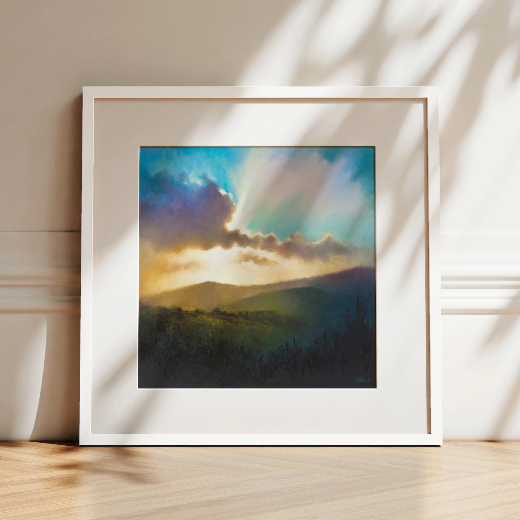 Come Up Here No.1, framed artwork in white of colourful sunset casting shadows over Exmoor National Park by contemporary artist Rachel Painter