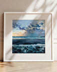 Towards The Light, white framed coastal art prints of of glowing sunset over the waves at Perranuthnoe beach by Cornwall artist Rachel Painter
